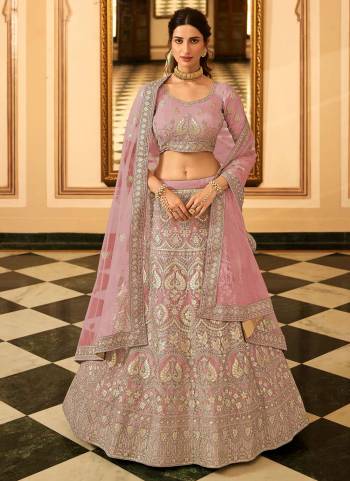 Grab These Heavy Designer Lehenga Choli In Lovely Color Paired With Pretty Designer Dupatta. Fabricated On Organza Beautified With Heavy Attractive Designer Jari,Thread Embroidery.Heavy Embroidery Is Making The Lehenga More Attractive.Buy Thses Pretty Collection Now