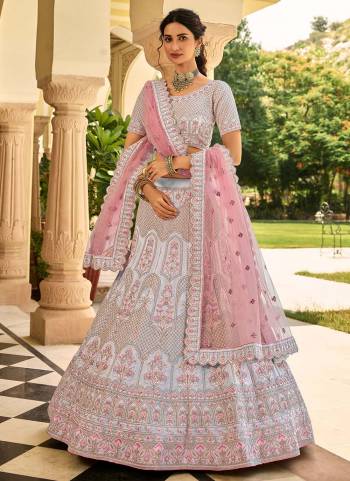 Grab These Heavy Designer Lehenga in Beautiful Coloed Pair With Designer Pretty Blouse And Dupatta These Lehenga is Beautified With Crepe Based Fabric Come With Crepe Blouses And Soft Net Dupatta Beautified With Heavy Designer Work