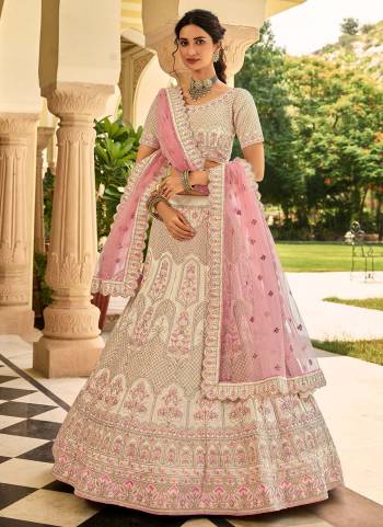 Grab These Heavy Designer Lehenga in Beautiful Coloed Pair With Designer Pretty Blouse And Dupatta These Lehenga is Beautified With Crepe Based Fabric Come With Crepe Blouses And Soft Net Dupatta Beautified With Heavy Designer Work