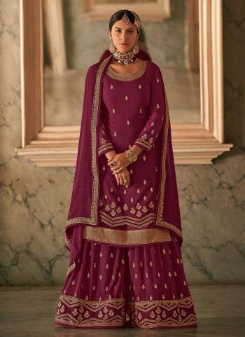 Here Is A Very Beautiful Designer Suit In Pretty Color Top is Fabricated On Georgette Pair With Readymade Georgette Bottom And Georgette Dupatta Beautified With Heavy Jari Embroidery Work