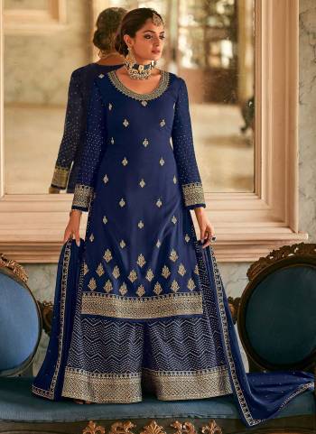 Here Is A Very Beautiful Designer Suit In Pretty Color Top is Fabricated On Georgette Pair With Readymade Georgette Bottom And Georgette Dupatta Beautified With Heavy Jari Embroidery Work