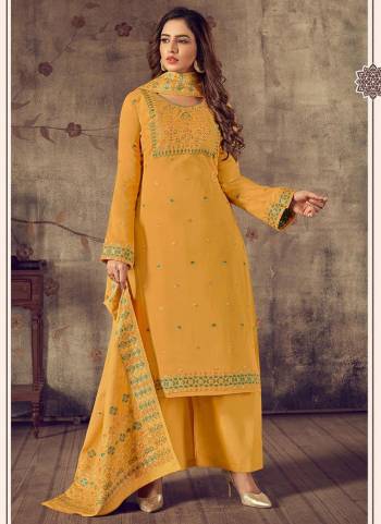 Here Is A Very Beautiful Designer Suit In Pretty Color Top is Fabricated On Cotton Pair With Jam Satin Bottom And Bemberg Chiffon Dupatta Beautified With Wevon Jacquard Designer,Hand Work