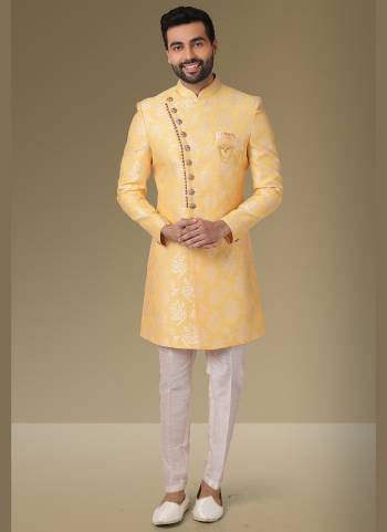 Grab These Beautiful Sherwani In Lovely Color Paired With Art Silk Bottom. Sherwani Is Fabricated On Jacquard Silk With Heavy Wevon Designer.Buy Thses Collection Now