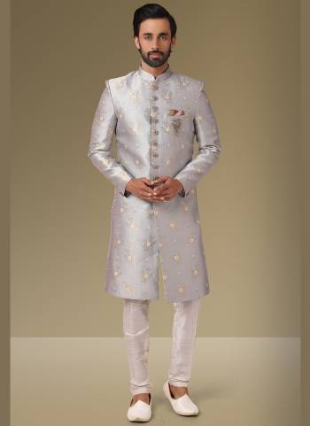 Grab These Beautiful Sherwani In Lovely Color Paired With Art Silk Bottom. Sherwani Is Fabricated On Jacquard Silk With Heavy Wevon Designer.Buy Thses Collection Now