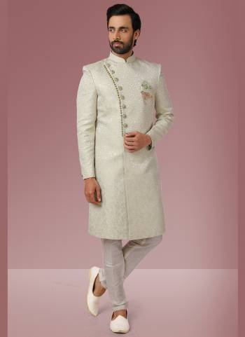 Grab These Beautiful Sherwani In Lovely Color Paired With Art Silk Bottom. Sherwani Is Fabricated On Jacquard Silk With Heavy Wevon Designer.Buy Thses Collection Now