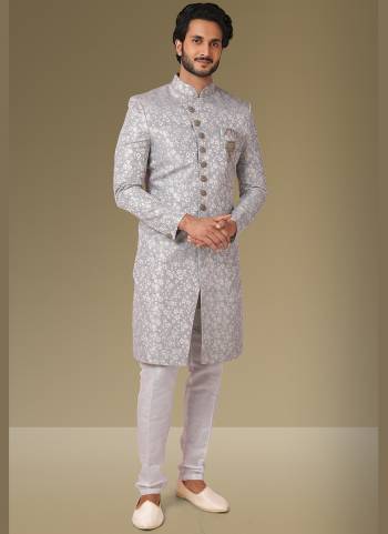 Grab These Beautiful Sherwani In Lovely Color Paired With Art Silk Bottom. Sherwani Is Fabricated On Jacquard Silk With Heavy Wevon Designer.Buy Thses Collection Now