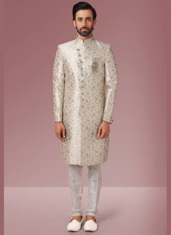 Grab These Beautiful Sherwani In Lovely Color Paired With Art Silk Bottom. Sherwani Is Fabricated On Jacquard Silk With Heavy Wevon Designer.Buy Thses Collection Now