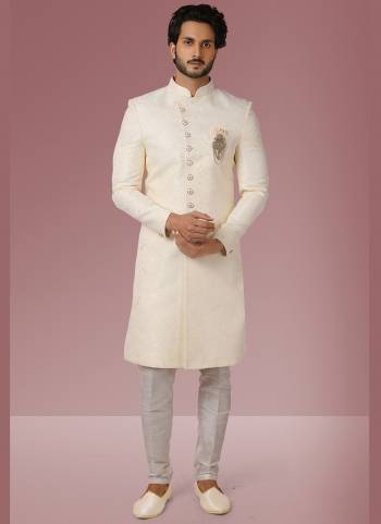 Grab These Beautiful Sherwani In Lovely Color Paired With Art Silk Bottom. Sherwani Is Fabricated On Jacquard Silk With Heavy Wevon Designer.Buy Thses Collection Now