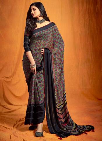 Grab These Lovely Saree In Black Colored Pair With Black Blouse.Saree And Blouse Are Fabricated On Georgette Beautified With Digital Printed