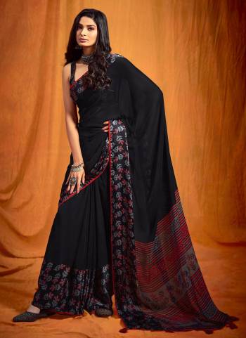 Grab These Lovely Saree In Black Colored Pair With Black Blouse.Saree And Blouse Are Fabricated On Georgette Beautified With Digital Printed