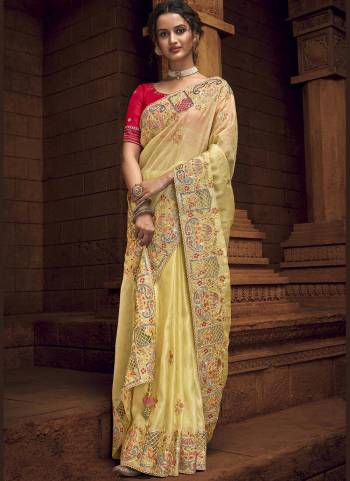 You Will Definitely Earn Lots Of Compliments Wearing This Pretty Elegant Looking Saree In Pretty Color Paired With Contrast Colored Blouse.This Saree is fabricated on Organza Pair With Art Silk Blouse.Beautified With Heavy Designer Embroidery,Stone Work