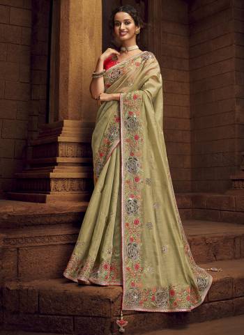 You Will Definitely Earn Lots Of Compliments Wearing This Pretty Elegant Looking Saree In Pretty Color Paired With Contrast Colored Blouse.This Saree is fabricated on Organza Pair With Art Silk Blouse.Beautified With Heavy Designer Embroidery,Stone Work