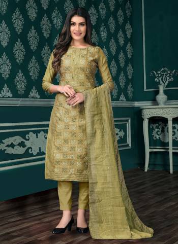 Here Is A Very Beautiful Suit In Pretty Colored Top Bottom And Dupatta. Top is Fabricated On Chanderi Pair With Santoon Bottom And Fancy Dupatta Beautified With Designer Embroidery Work