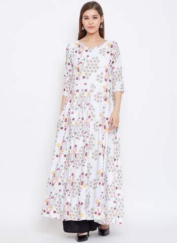 For A Bold And Beautiful Look, Grab This Beautiful Readymade Gown In Cream Color?Fabricated On Muslin. It Has Very Beautiful Digital Printed Pattern With Come All Regular Size