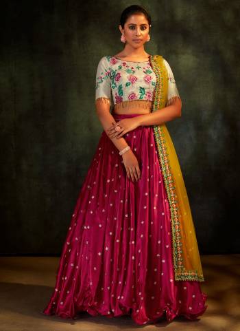 For A Rich And Subtle Look, Grab This Designer Lehenga In White Colored Pair With Burgundy Blouse And Yellow Dupatta. It Has Very Beautiful Pattern With Heavy Thread,Sequance Embroidery Work