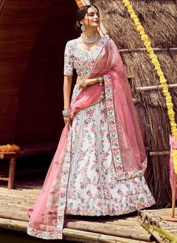 Get Ready For The Upcoming Wedding Season With This Very Beautiful Heavy Designer Lehenga Choli With  Embroidery In Pretty Color Paired With Pretty Colored Dupatta. This Lehenga Choli Is Fabricated On Satin Silk Paired With Soft Net Fabricated Dupatta. Buy Now