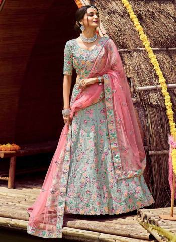 Get Ready For The Upcoming Wedding Season With This Very Beautiful Heavy Designer Lehenga Choli With  Embroidery In Pretty Color Paired With Pretty Colored Dupatta. This Lehenga Choli Is Fabricated On Satin Silk Paired With Soft Net Fabricated Dupatta. Buy Now