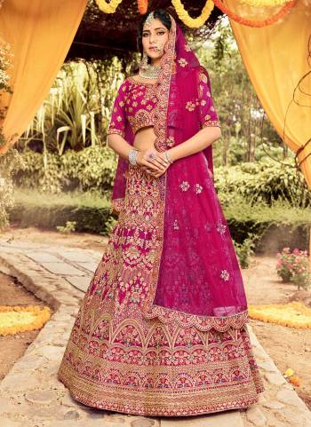 For A Lovely Designer Look, Grab This Trendy Designer Lehenga Choli In All Over?Same Color. This Heavy Embroidered Lehenga Choli Is Fabricated On Organza Paired With Net Fabricated Dupatta. Its Pretty Dori,Gota Embroidery,Zarkan Work Will Definitely Earn You Lots Of Compliments From Onlookers.