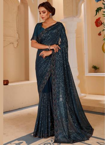 For A Beautiful Look, Grab This Saree In Beautifull Colored Paired With Pretty Colored Blouse. This Saree Is Fabricated On Blooming Georgette Pair With Banglori Silk Blouse Beautified With Heavy Sequance Swarovski Work.