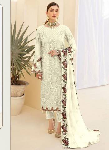 Here Is A Very Beautiful Suit In Pretty Colored Top Bottom And Dupatta. Top is?Fabricated On Faux Georgette Pair With Santoon Bottom And Nazmin Dupatta Beautified With Designer Heavy Embroidery,Diamond Work