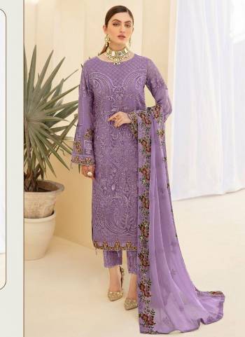 Here Is A Very Beautiful Suit In Pretty Colored Top Bottom And Dupatta. Top is?Fabricated On Faux Georgette Pair With Santoon Bottom And Nazmin Dupatta Beautified With Designer Heavy Embroidery,Diamond Work