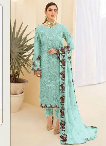 Here Is A Very Beautiful Suit In Pretty Colored Top Bottom And Dupatta. Top is?Fabricated On Faux Georgette Pair With Santoon Bottom And Nazmin Dupatta Beautified With Designer Heavy Embroidery,Diamond Work