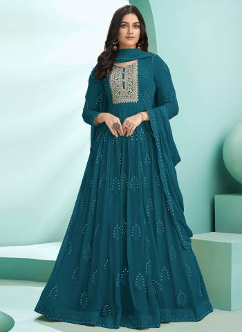 Here Is A Very Beautiful Suit In Pretty Colored Top Bottom And Dupatta. Top is?Fabricated On Georgette Pair With Santoon Bottom And Georgette Dupatta Beautified With Heavy Resham Embroidery,Diamond Work