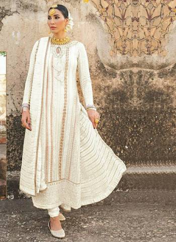 Royal And Elegant Looking Designer Suit Is Here In All Over Pretty Colored Top?and Bottom And Dupatta. This Semi-Stitched Suit Is Georgette Based Beautified With Heavy Designer Embroidery,Diamond Work