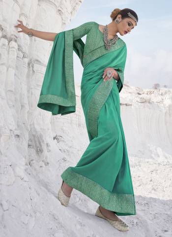 Simple And Elegant Looking Fancy Saree Is Here In Pretty Color Paired?With Contrasting Colored Blouse. Its Saree Is Fabricated On Poly SIlk Paired With Brocade Blouse. Buy This Rich And Elegant Looking Saree Now