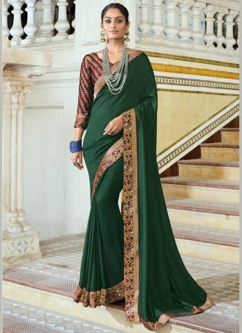 Simple And Elegant Looking Fancy Saree Is Here In Pretty Color Paired?With Contrasting Colored Blouse. Its Saree Is Fabricated On Poly SIlk Paired With Brocade Blouse. Buy This Rich And Elegant Looking Saree Now