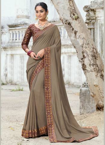 Simple And Elegant Looking Fancy Saree Is Here In Pretty Color Paired?With Contrasting Colored Blouse. Its Saree Is Fabricated On Poly SIlk Paired With Brocade Blouse. Buy This Rich And Elegant Looking Saree Now