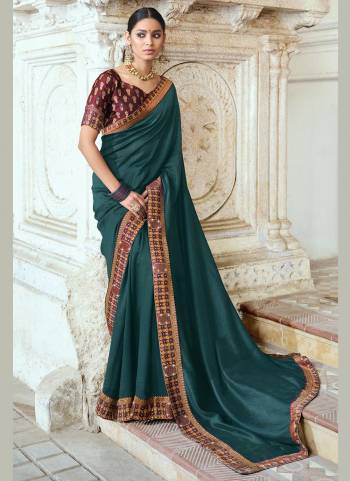 Simple And Elegant Looking Fancy Saree Is Here In Pretty Color Paired?With Contrasting Colored Blouse. Its Saree Is Fabricated On Poly SIlk Paired With Brocade Blouse. Buy This Rich And Elegant Looking Saree Now