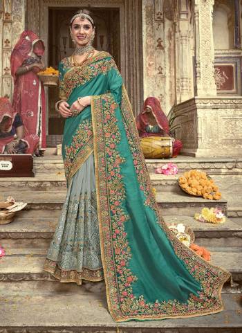 Simple And Elegant Looking Saree is Here in Pretty Colored.Its Saree And Blouse Fabricated On Art Silk Come With Heavy Designer Embroidery,Diamond Work.