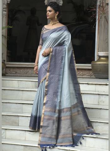 For A Pretty Look,Grab These Beautiful Saree Come With Pretty Blouse.Its Saree is Fabricated On South Silk  Pair With Art Silk Blouse Beautified With Wevon Checks   Work