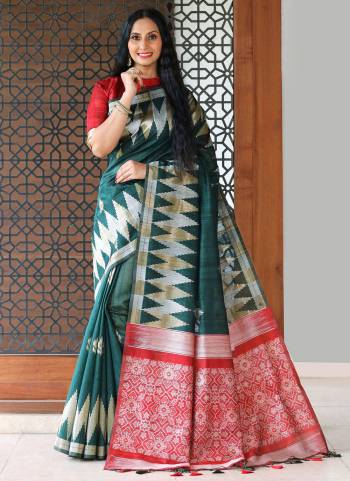 Here Is A Very Beautiful Saree In Pretty Colored. Its Saree And Blouse Are Fabricated On Tussar Silk Beautified Heavy Wevon Patola Designer.