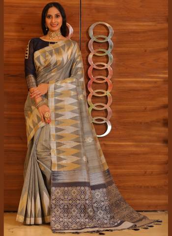 Here Is A Very Beautiful Saree In Pretty Colored. Its Saree And Blouse Are Fabricated On Tussar Silk Beautified Heavy Wevon Patola Designer.