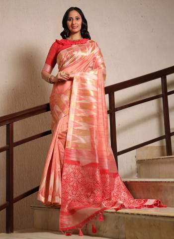 Here Is A Very Beautiful Saree In Pretty Colored. Its Saree And Blouse Are Fabricated On Tussar Silk Beautified Heavy Wevon Patola Designer.