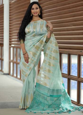 Here Is A Very Beautiful Saree In Pretty Colored. Its Saree And Blouse Are Fabricated On Tussar Silk Beautified Heavy Wevon Patola Designer.