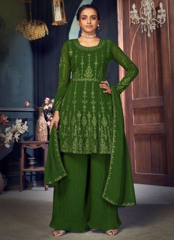 For a Pretty Look,Grab These Designer Sharara Suit in Bright Colored.its Fabricated On Faux Georgette Based Pair With Bottom And Dupatta.Beautified With Embroidery, Diamond Work 