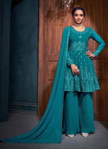 For a Pretty Look,Grab These Designer Sharara Suit in Bright Colored.its Fabricated On Faux Georgette Based Pair With Bottom And Dupatta.Beautified With Embroidery, Diamond Work 