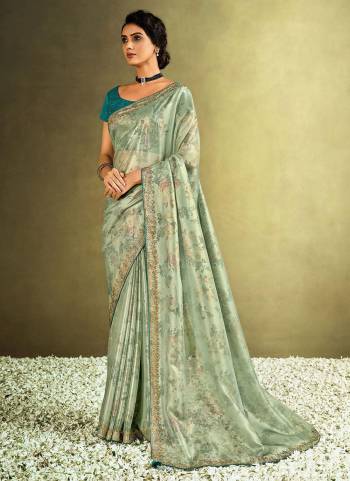 Simple And Elegant Looking Saree is Here in Pretty Colored.Its Saree And Blouse?Fabricated On Silk Based Come With Digital Printed Flowers,Stone Embellishments