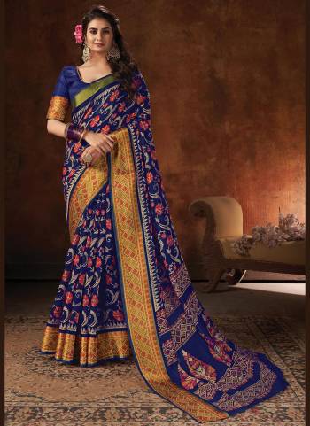 Enhnace Your Beauty Wearing This Pretty Colored Saree Paired With Matching Colored Blouse. This Saree Is Fabricated On Cotton Paired With Cotton Fabricated Blouse. It Is Beautified Wevon Designer,Printed.