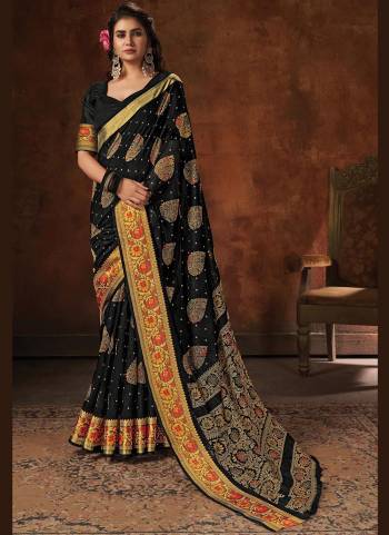 Enhnace Your Beauty Wearing This Pretty Colored Saree Paired With Matching Colored Blouse. This Saree Is Fabricated On Cotton Paired With Cotton Fabricated Blouse. It Is Beautified Wevon Designer,Printed.