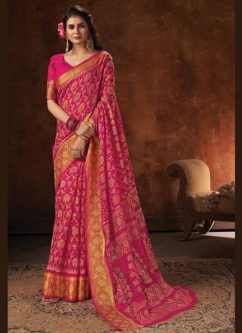 Enhnace Your Beauty Wearing This Pretty Colored Saree Paired With Matching Colored Blouse. This Saree Is Fabricated On Cotton Paired With Cotton Fabricated Blouse. It Is Beautified Wevon Designer,Printed.