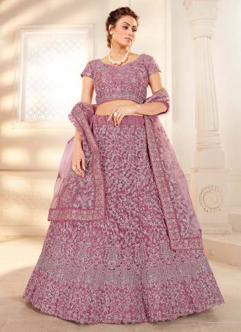 For A Amazing Look , Grab These Heavy Designer Lehenga Choli in All Over Pretty Colored.Its Lehenga is Fabricated On Net Based Pair With Net Blouse And Net Dupatta.Beautified With Heavy Cording Embroidery,Zarkan Work