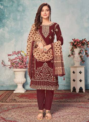 For A Beautiful Look , Grab These Lovely Suit In All Over Maroon Color.its Top is Fabricated On Faux Georgette Pair With Santoon Bottom And Faux Georgette Dupatta Come With Heavy Embroidery Work.