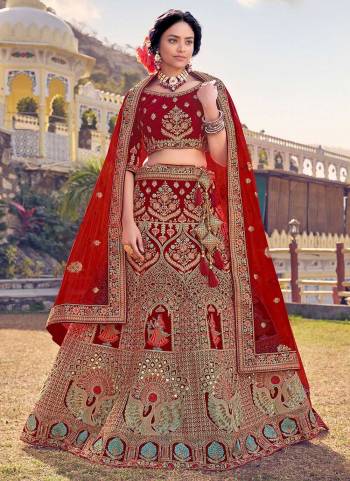 Grab These Heavy Designer Lehenga In Pretty Colored Pair With Pretty Designer Blouse And Dupatta.Its lehenga is Fabricated on Velvet Based Pair With Velvet Blouse And Soft Net Dupatta.Beautified With Heavy Designer Embroidery Work