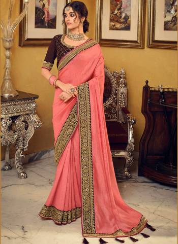 For A Pretty Look, Grab These Pretty Colored Saree Pair With Contrast Colored Blouse.Its Saree is Fabricated On Vichitra Silk Pair With Phantom Silk Blouse. Beautified With Heavy Jari Embroidery Work