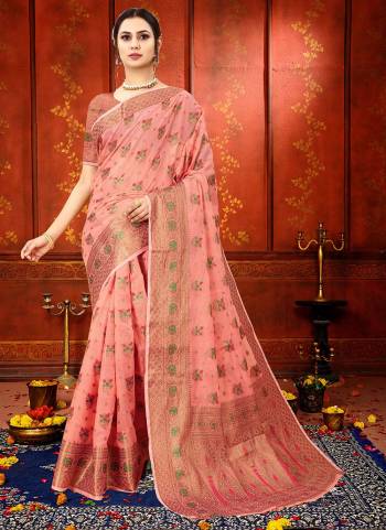 Simple And Elegant Looking Saree is Here in Pretty Colored.Its Saree is Fabricated On Soft Cotton Silk Pair With Brocade Silk Blouse.Beautified With Heavy Copper Jari Meenakari Wevon Designer