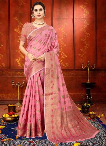 Simple And Elegant Looking Saree is Here in Pretty Colored.Its Saree is Fabricated On Soft Cotton Silk Pair With Brocade Silk Blouse.Beautified With Heavy Copper Jari Meenakari Wevon Designer